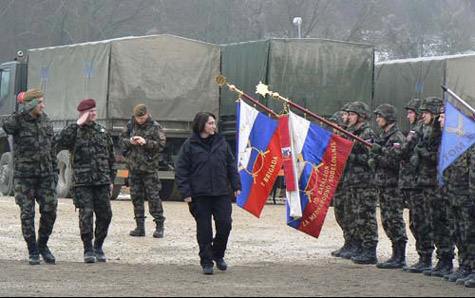 Defense Minister Ljubica Jelušič greeting Slovenian troops at the largest